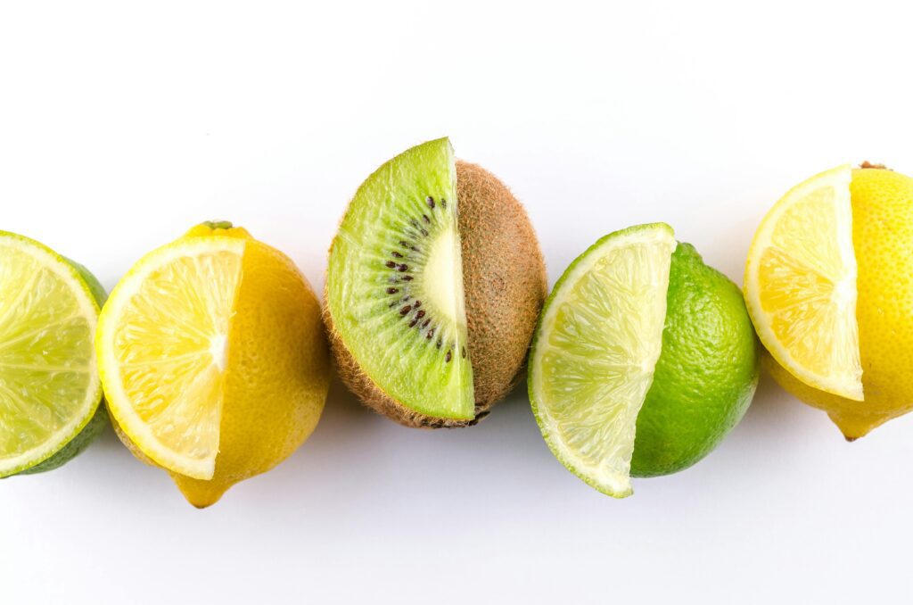 lime lemon and kiwi with white clean background studio photo