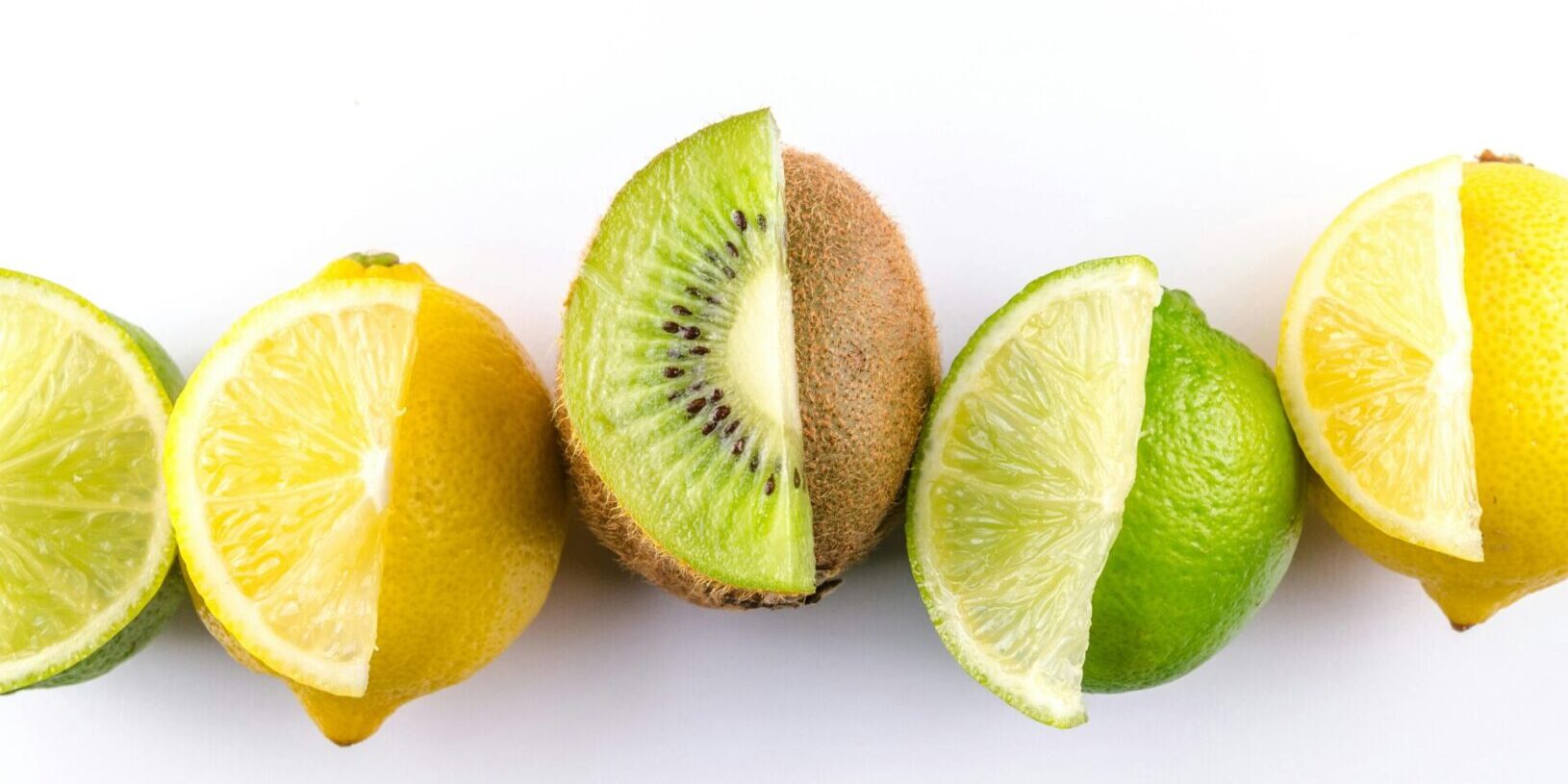 lime lemon and kiwi with white clean background studio photo